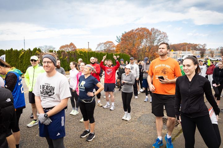 Participants setting off from the start in a loose crowd